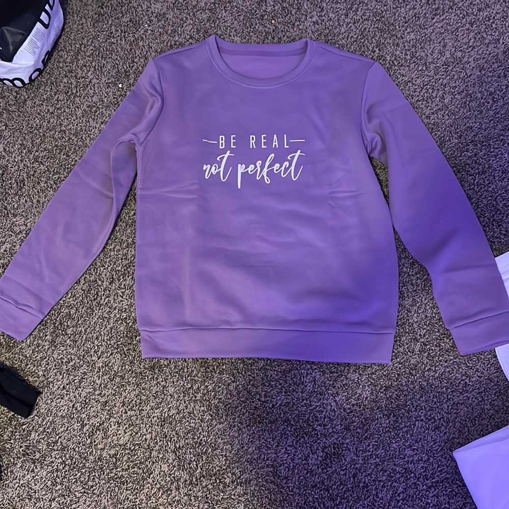 purple sweatshirt